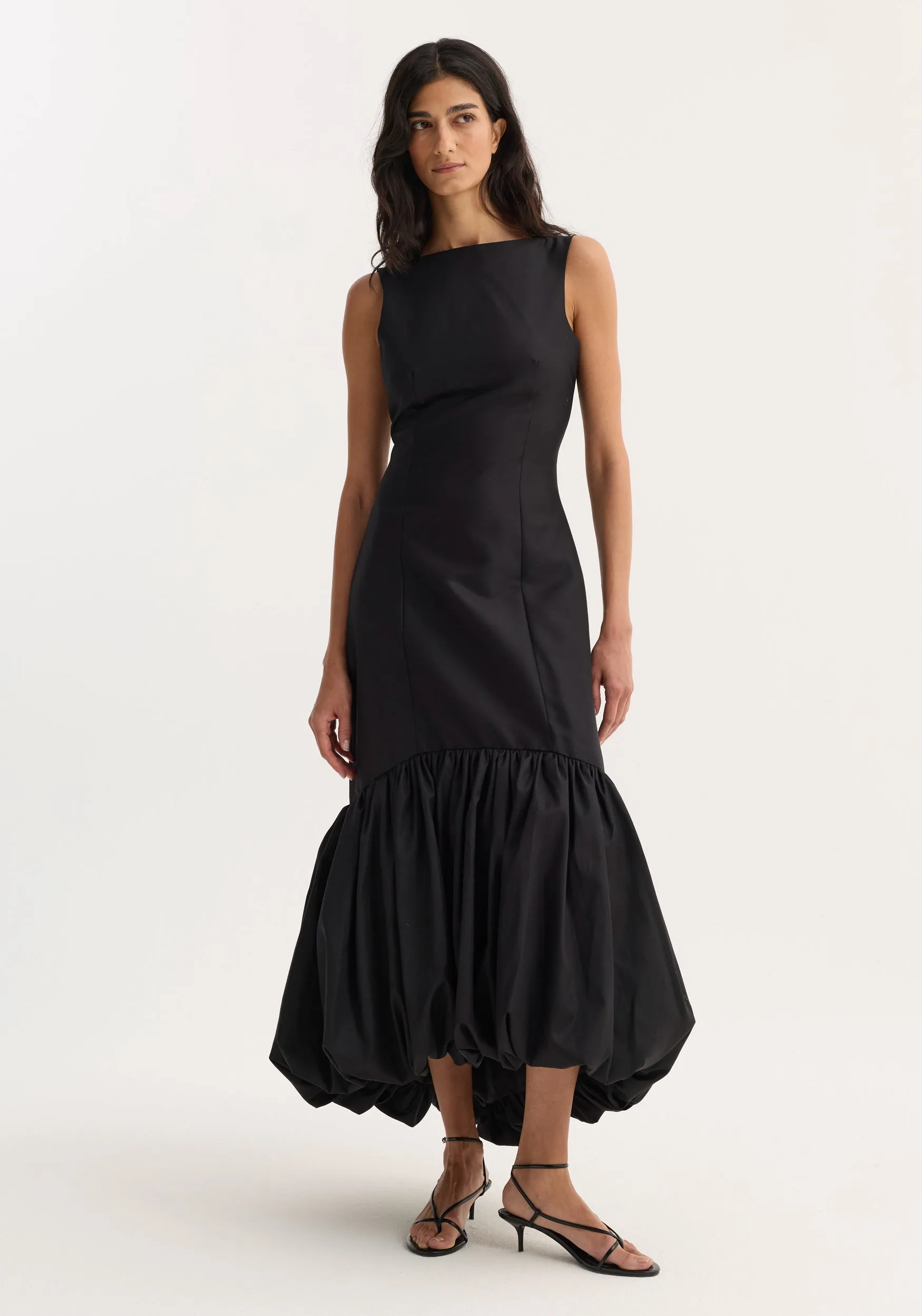 Voluminous dress | black sold by Rohe