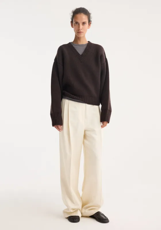 Sculptural compact v-neck | dark brown made by Rohe
