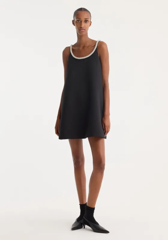 A-line appliqué dress | black made by Rohe