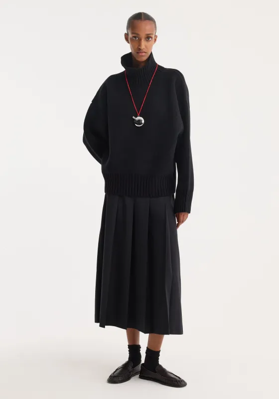 Sculptural compact turtleneck | black made by Rohe