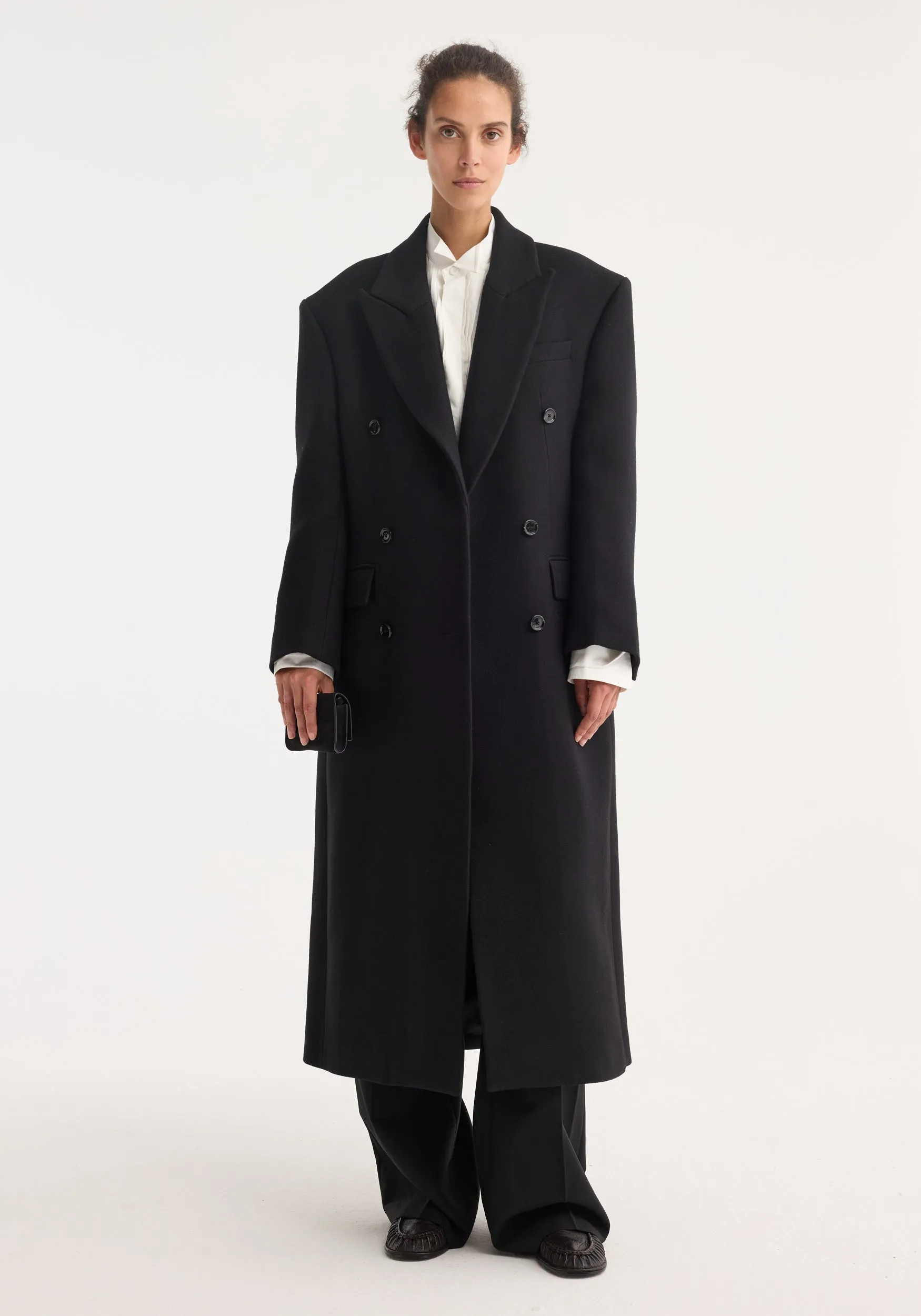 Hourglass wool coat | black sold by Rohe