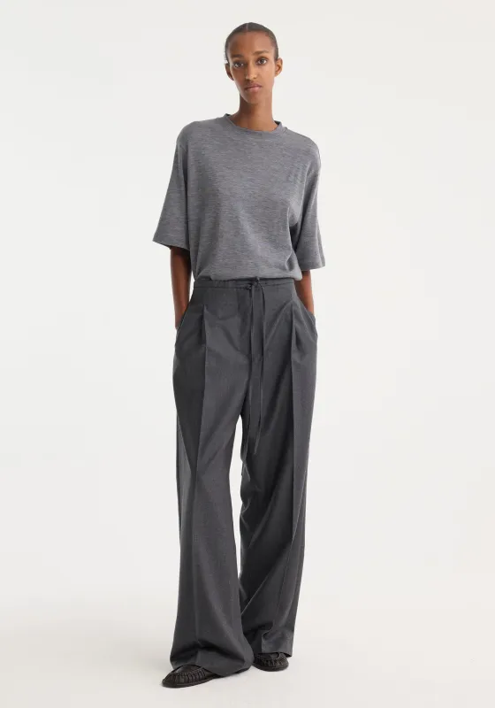 Relaxed soft wool trousers | dark grey melange sold by Rohe