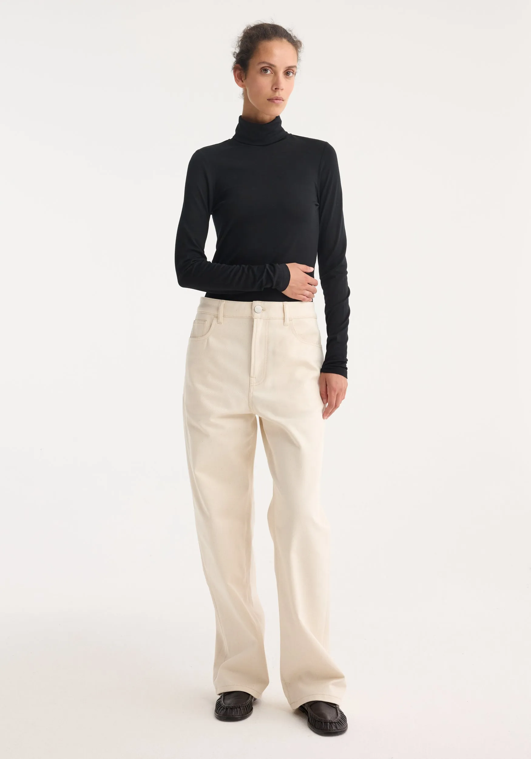 Fine merino turtleneck | black sold by Rohe