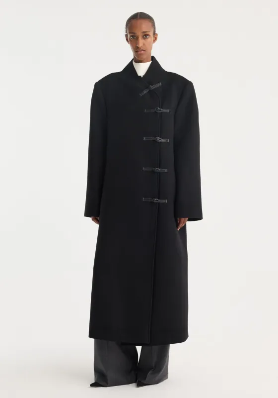 Mandarin wool coat | black sold by Rohe