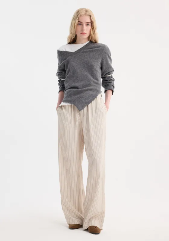 Wide leg silk trousers | classic stripe sold by Rohe