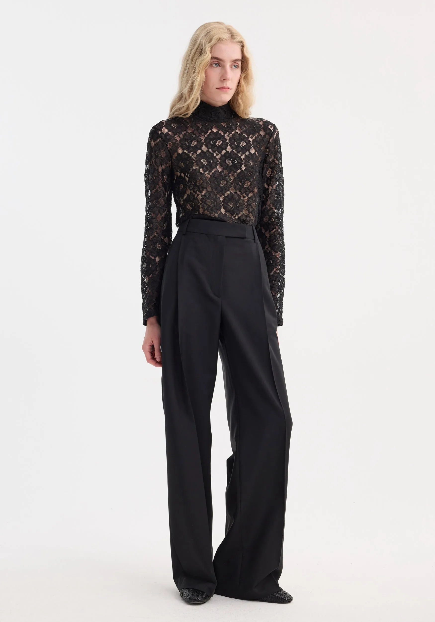 Lace turtleneck top | black sold by Rohe