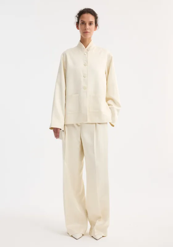 Pearl button satin jacket | cream made by Rohe