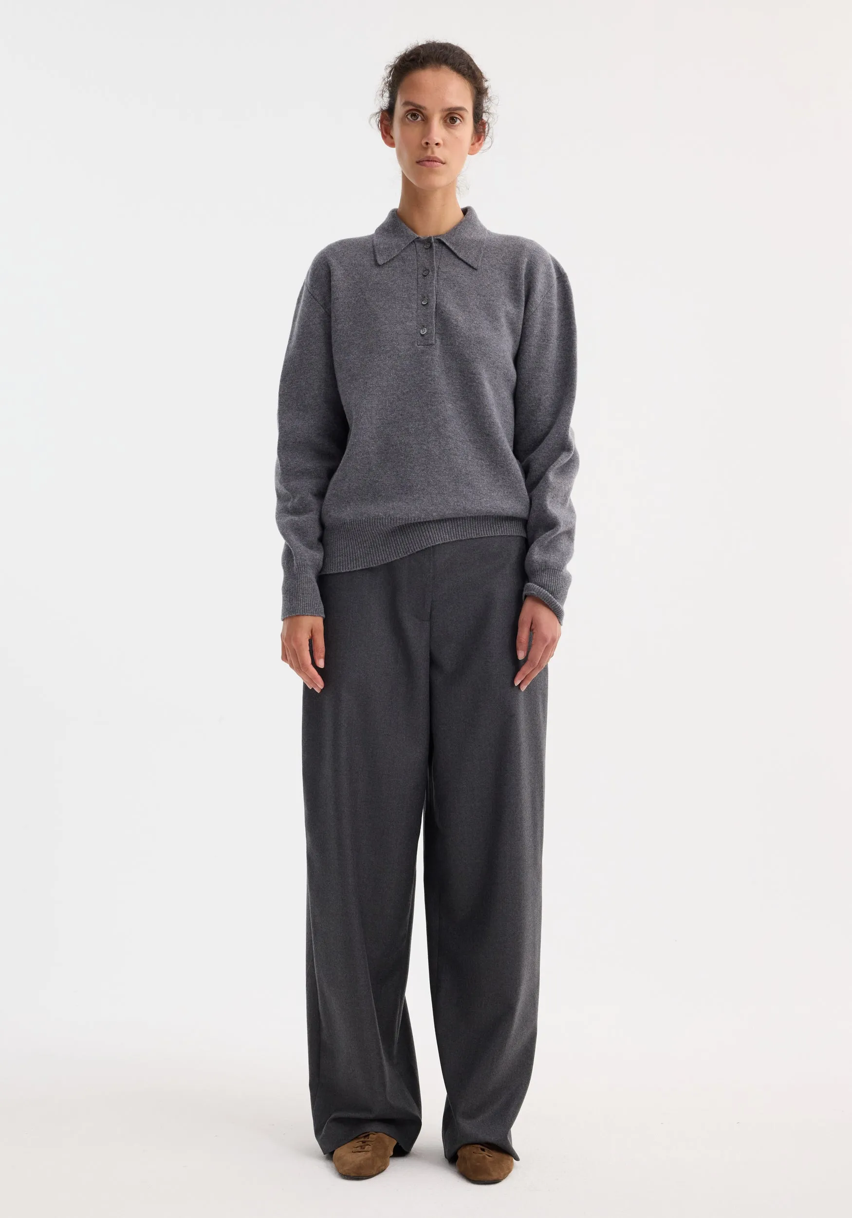 Compact knitted polo | mid grey melange sold by Rohe