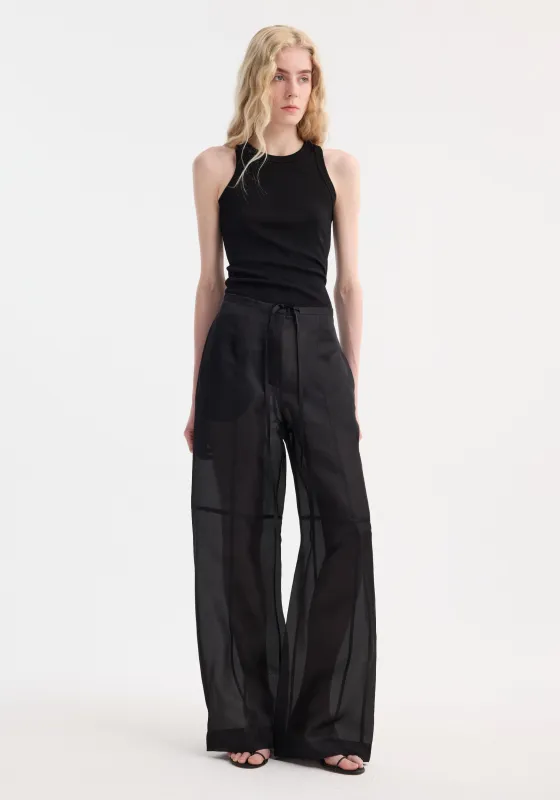 Organza silk parachute trousers | black sold by Rohe
