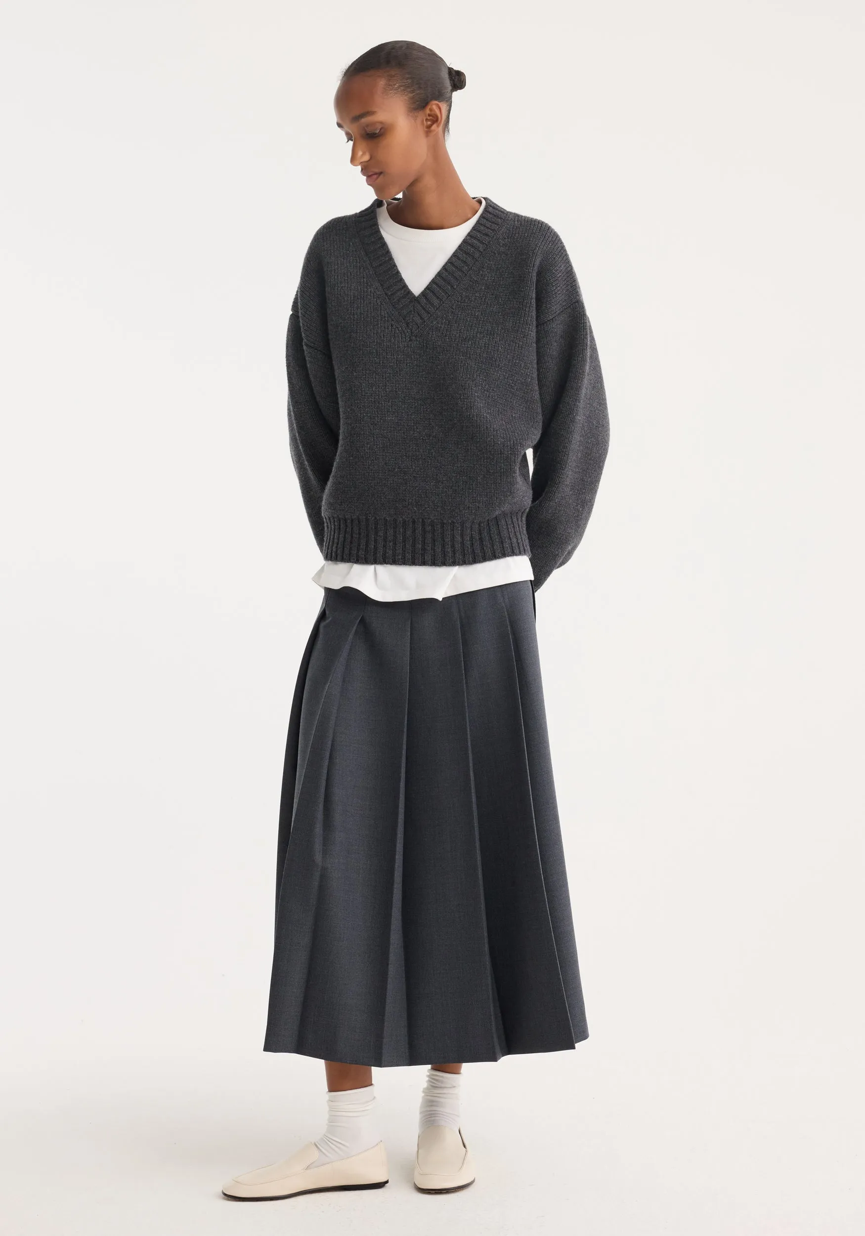 Pleated wrap skirt | dark grey melange sold by Rohe