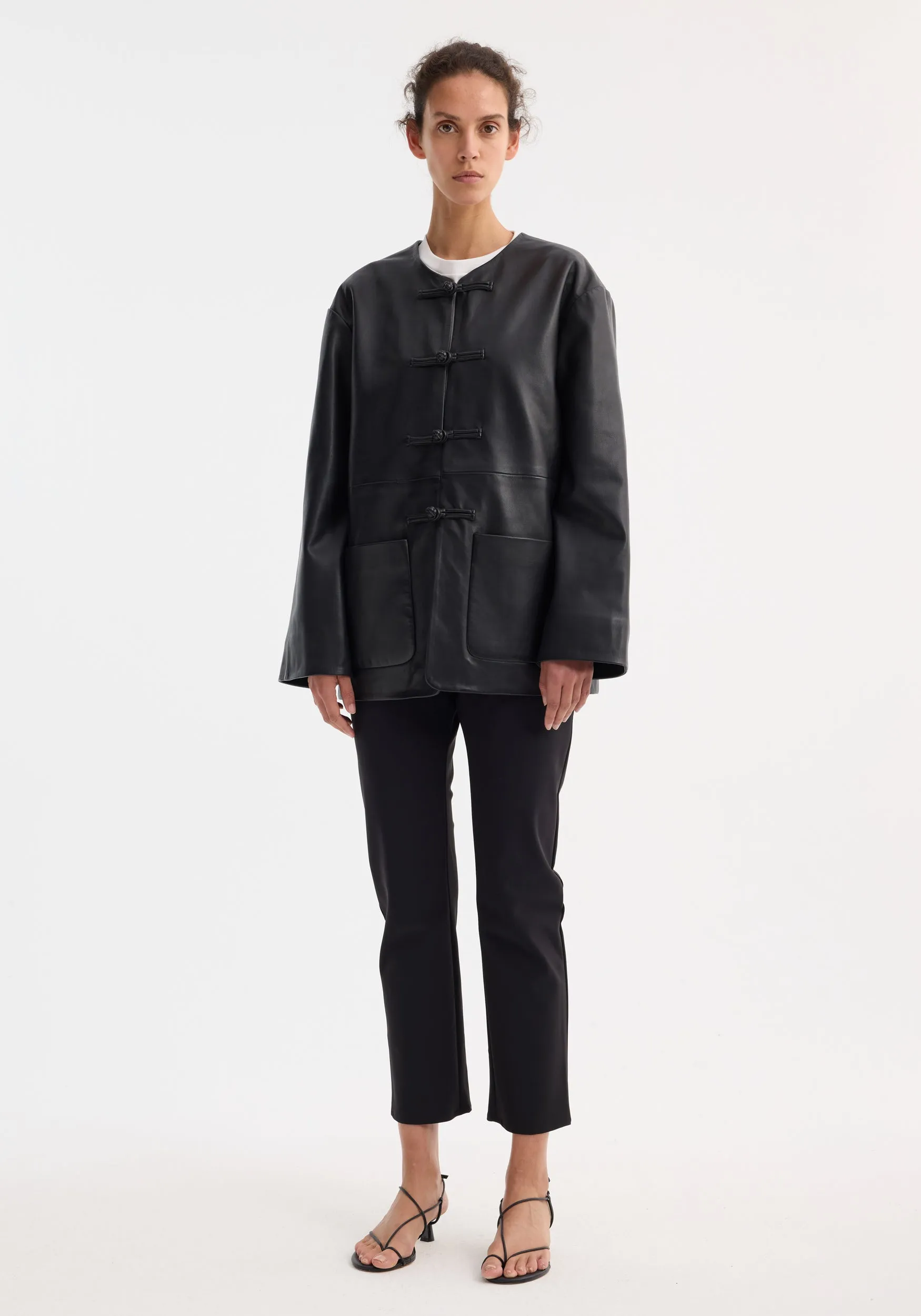 Pankou closure leather jacket | black sold by Rohe