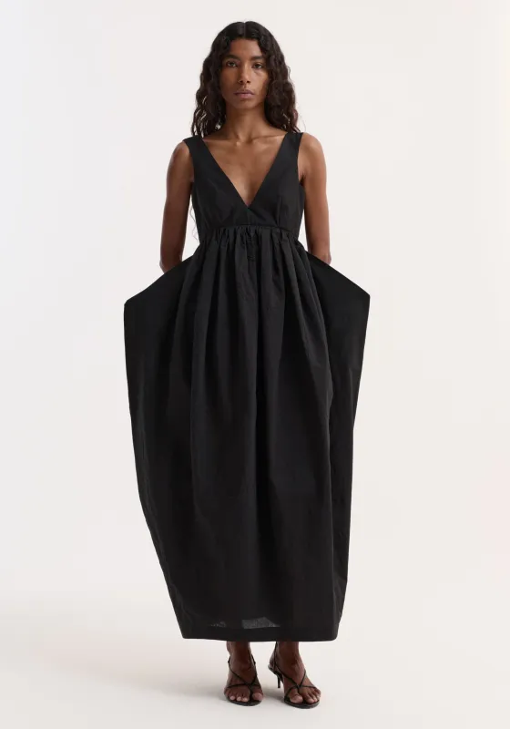 Sculptural textured cotton dress | black sold by Rohe