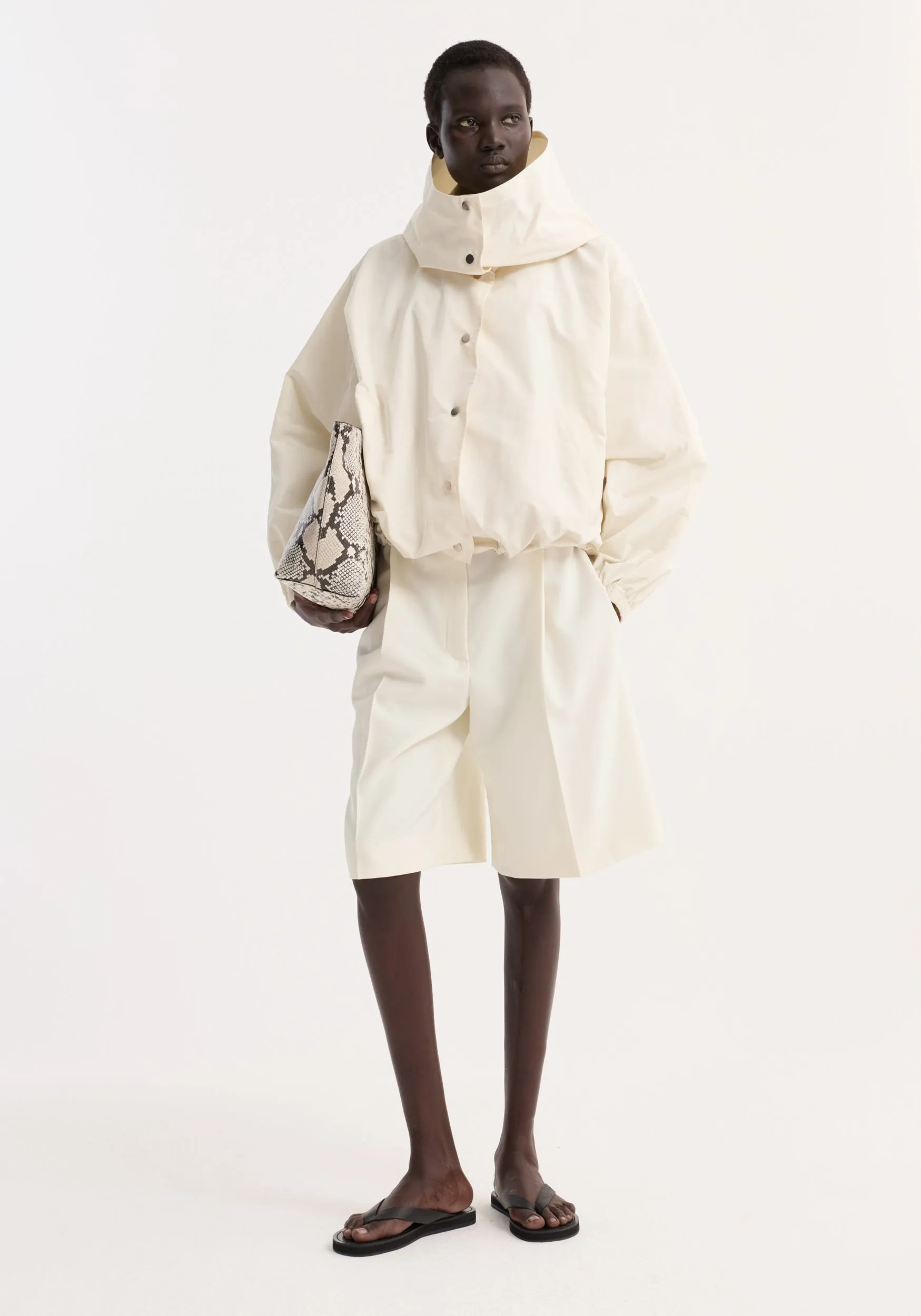 Volume silk-blend jacket | cream sold by Rohe