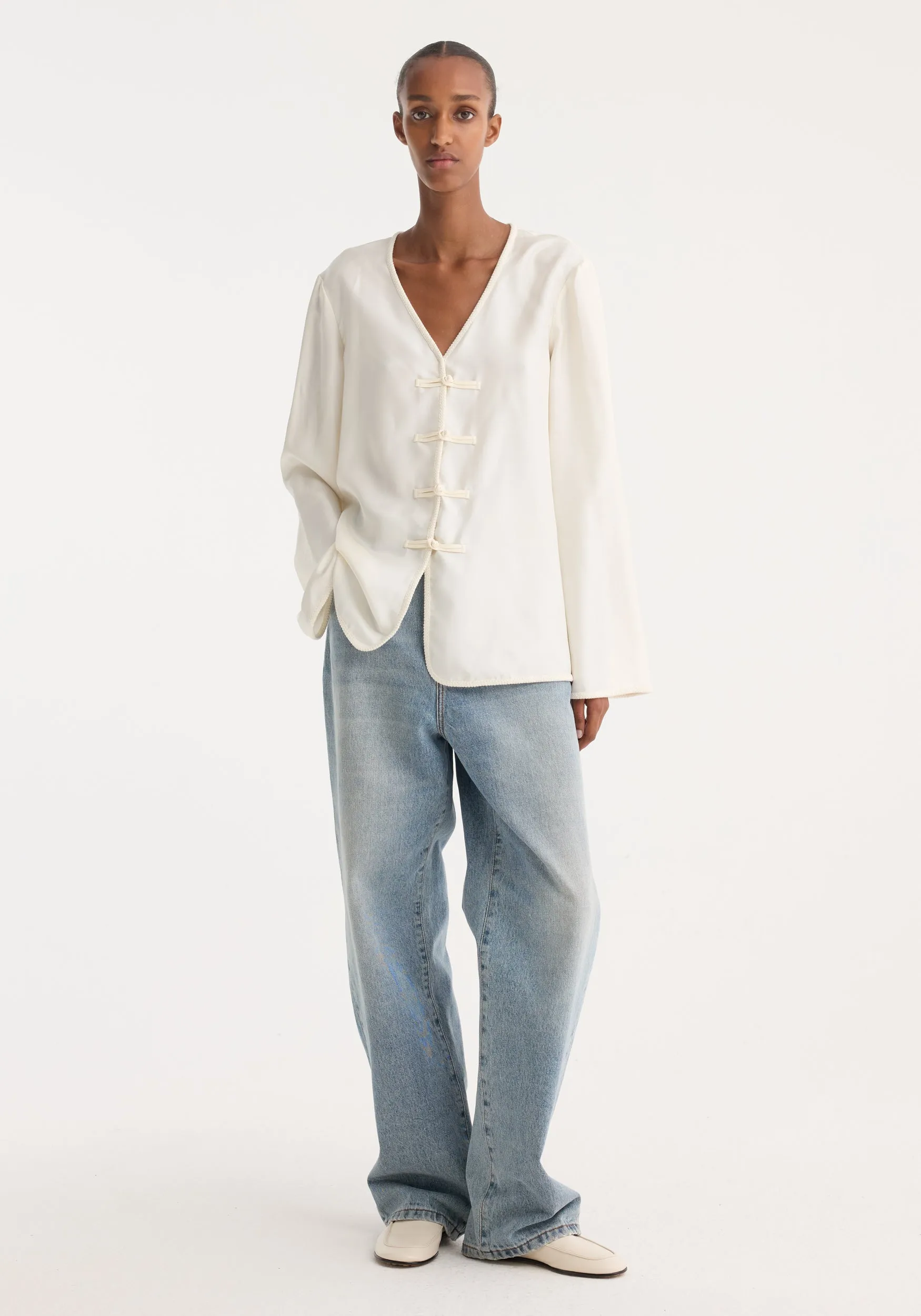 Pankou closure silk top | cream sold by Rohe