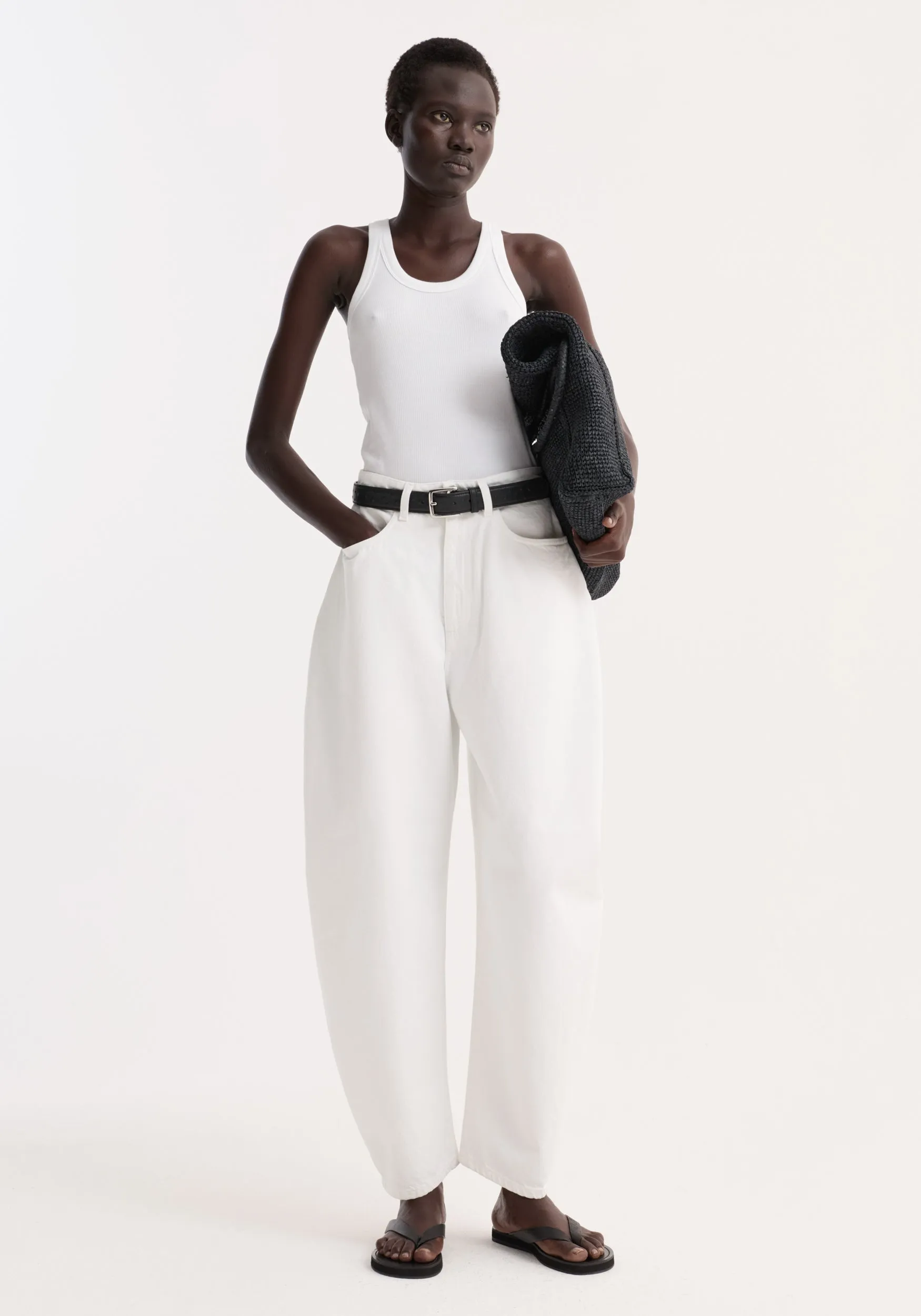 Sculptural denim trousers | optic white sold by Rohe