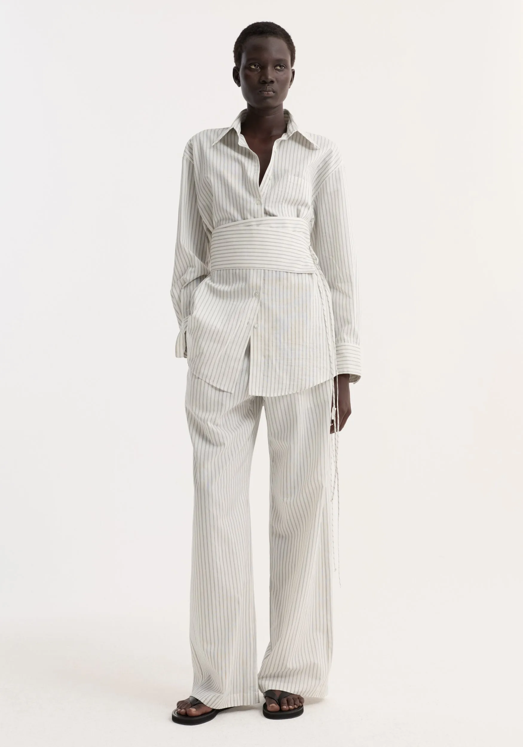 Silk stripe belted shirt | fine stripe sold by Rohe