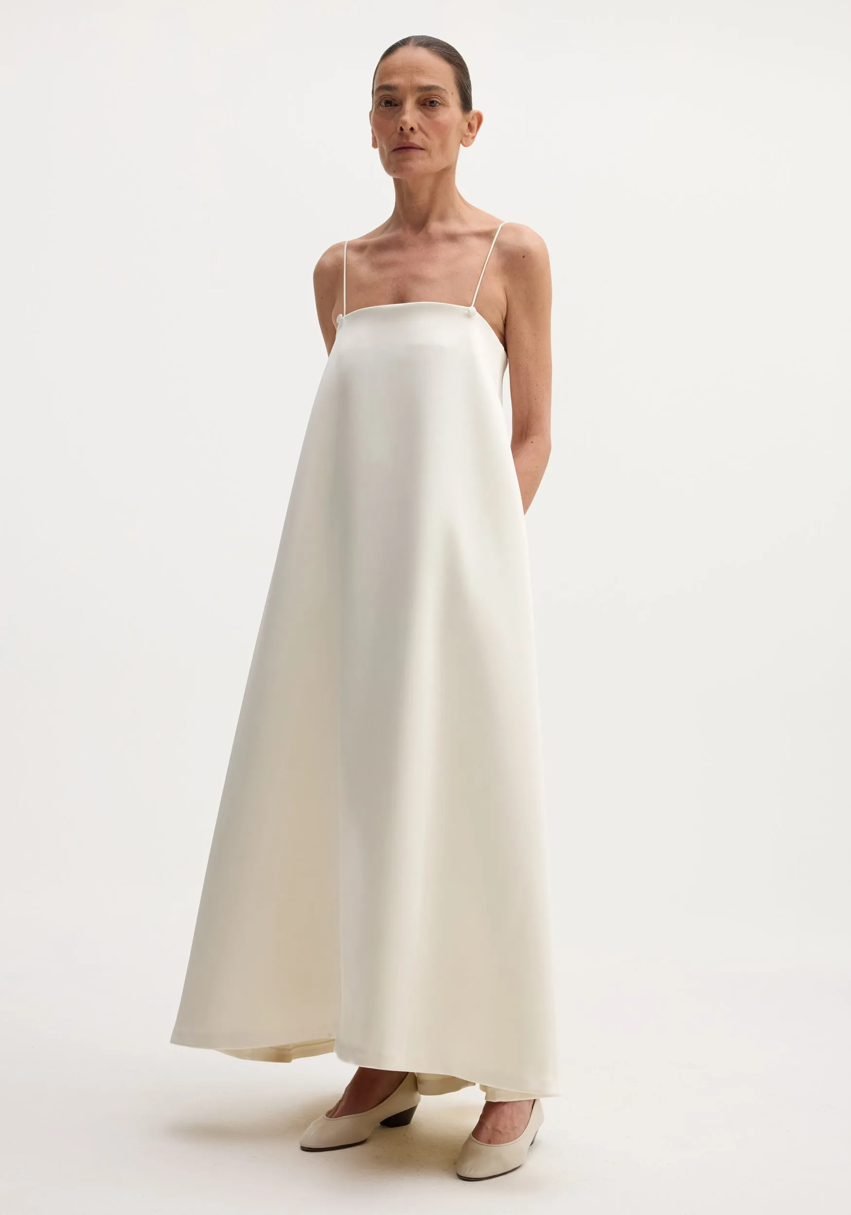Voluminous satin dress | ivory sold by Rohe