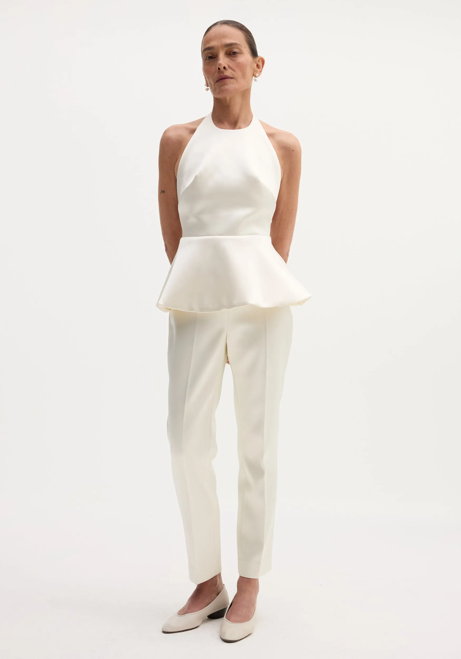 Sculptural satin halter top | ivory sold by Rohe