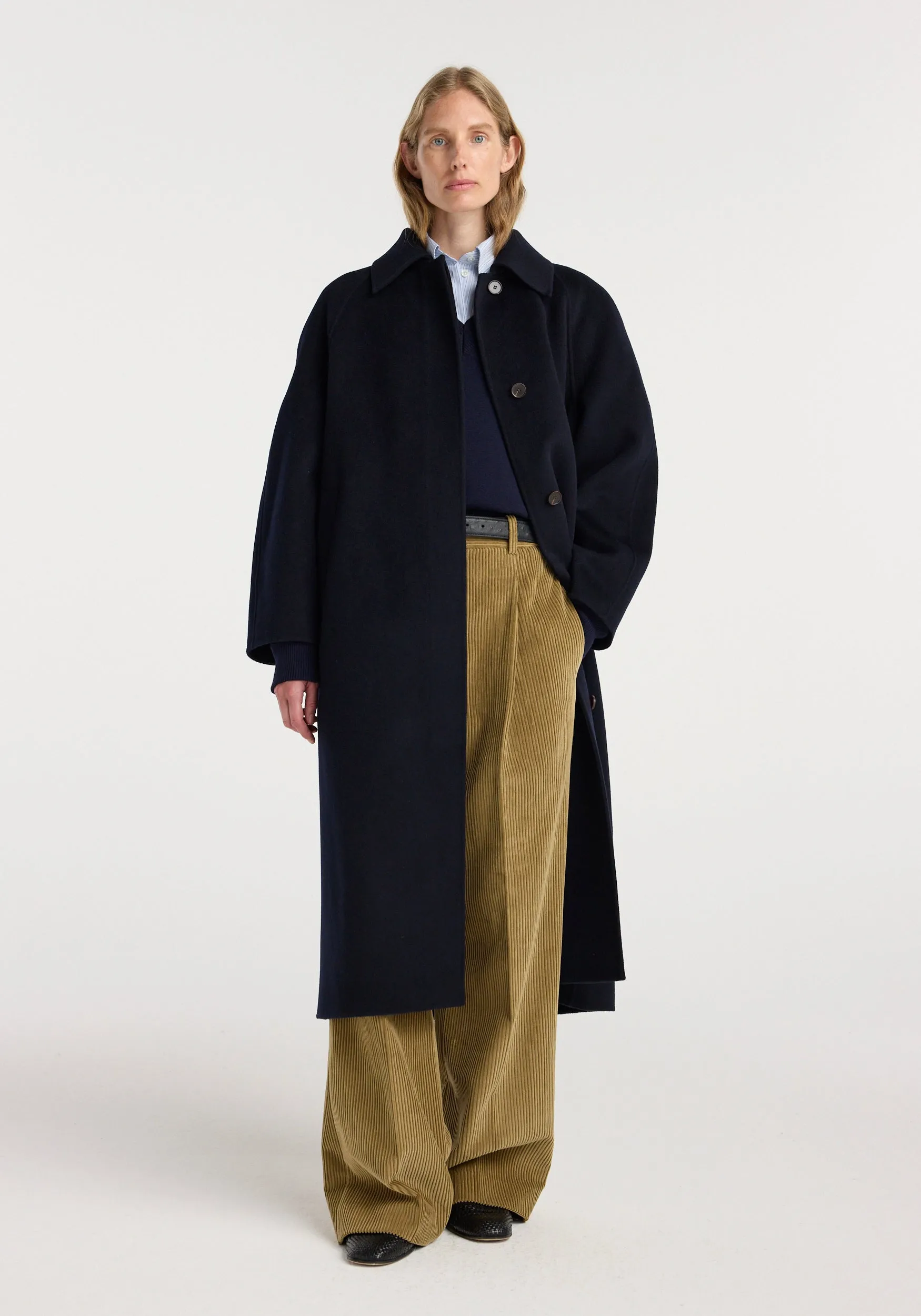 Double-faced wool padded coat | navy sold by Rohe
