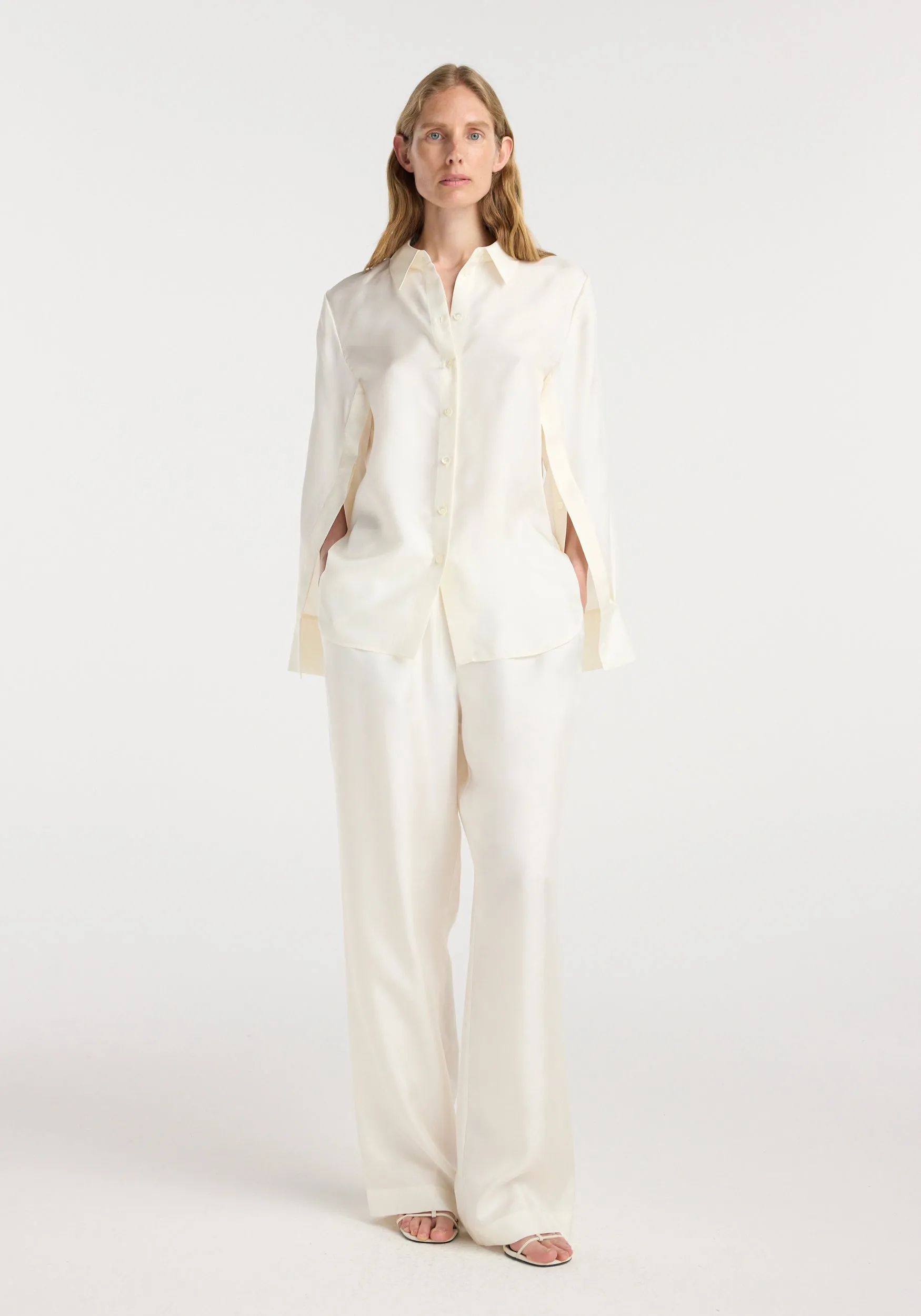 Silk open-sleeve detailed shirt | cream sold by Rohe