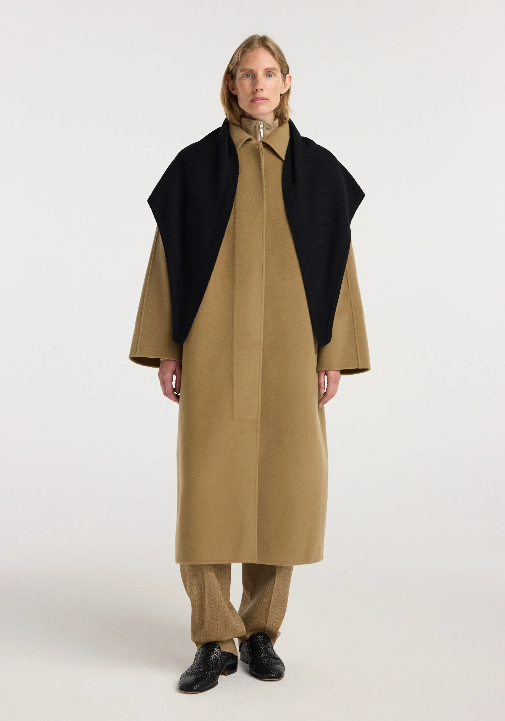 Large knitted triangle scarf | black sold by Rohe