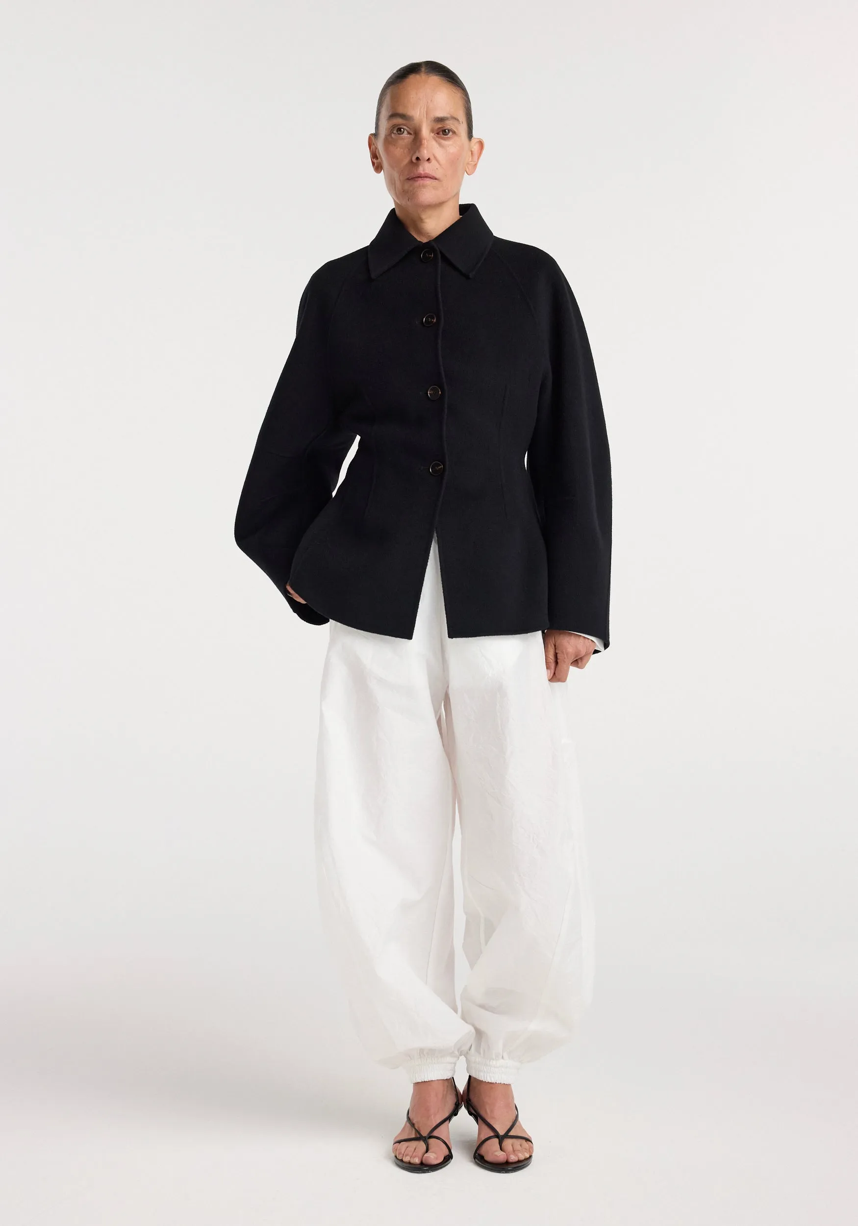 Double-faced sculptural jacket | black sold by Rohe
