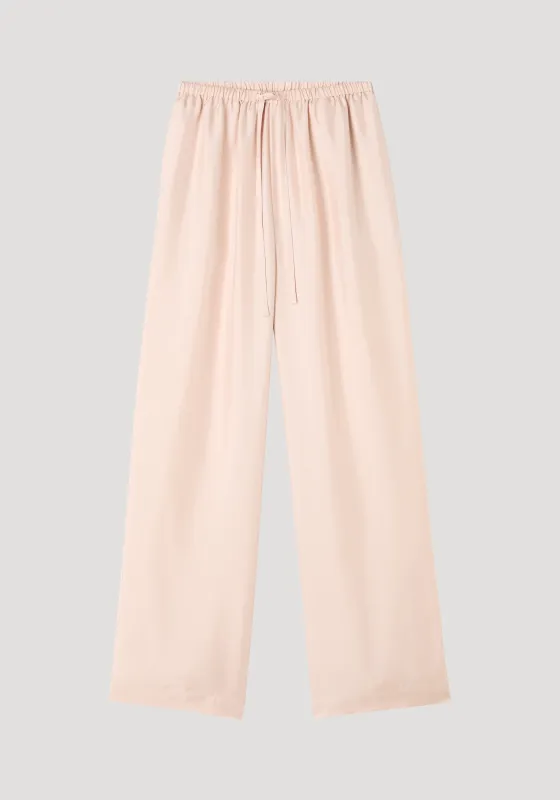 Relaxed silk trousers | rose made by Rohe