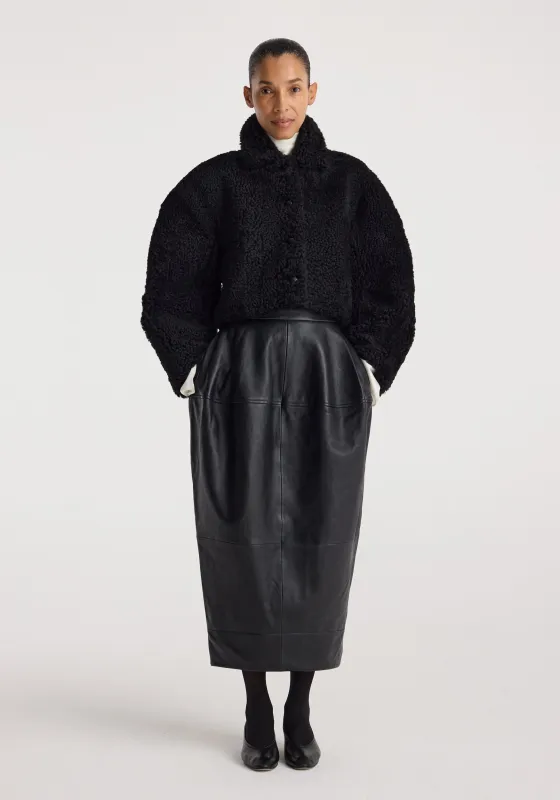 Rounded shearling jacket | black made by Rohe