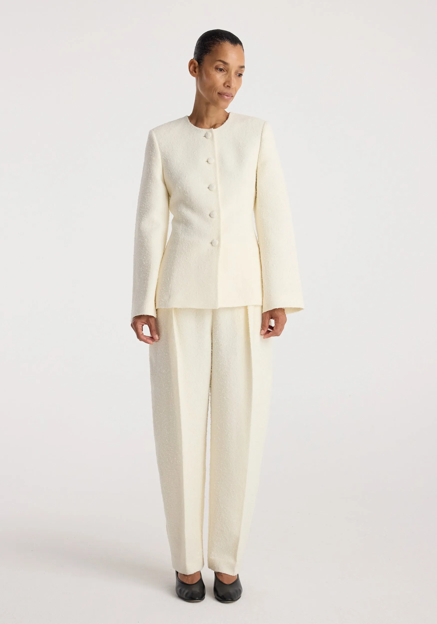 Bouclé shaped blazer | cream sold by Rohe