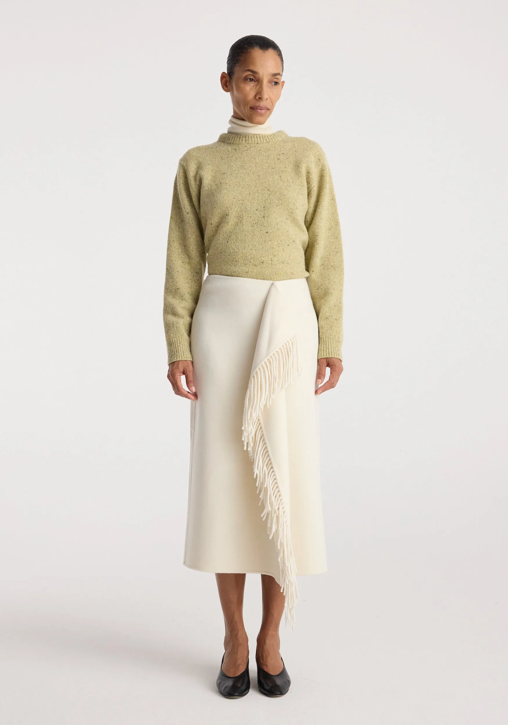 Double-faced fringe skirt | off white sold by Rohe