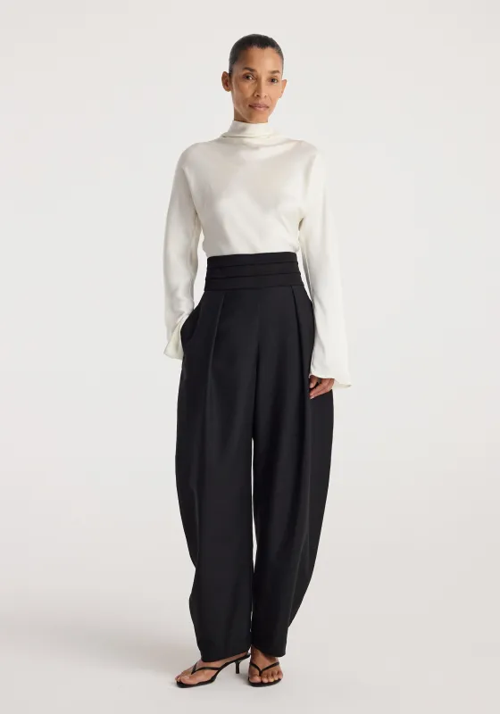 Puck - Sculptural cumberband trousers | black made by Rohe