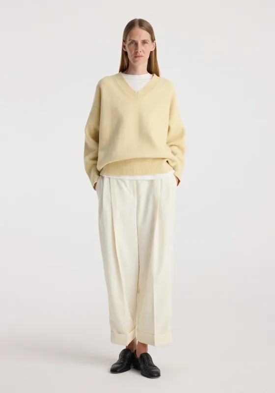 High-waist turn up trousers | off white made by Rohe