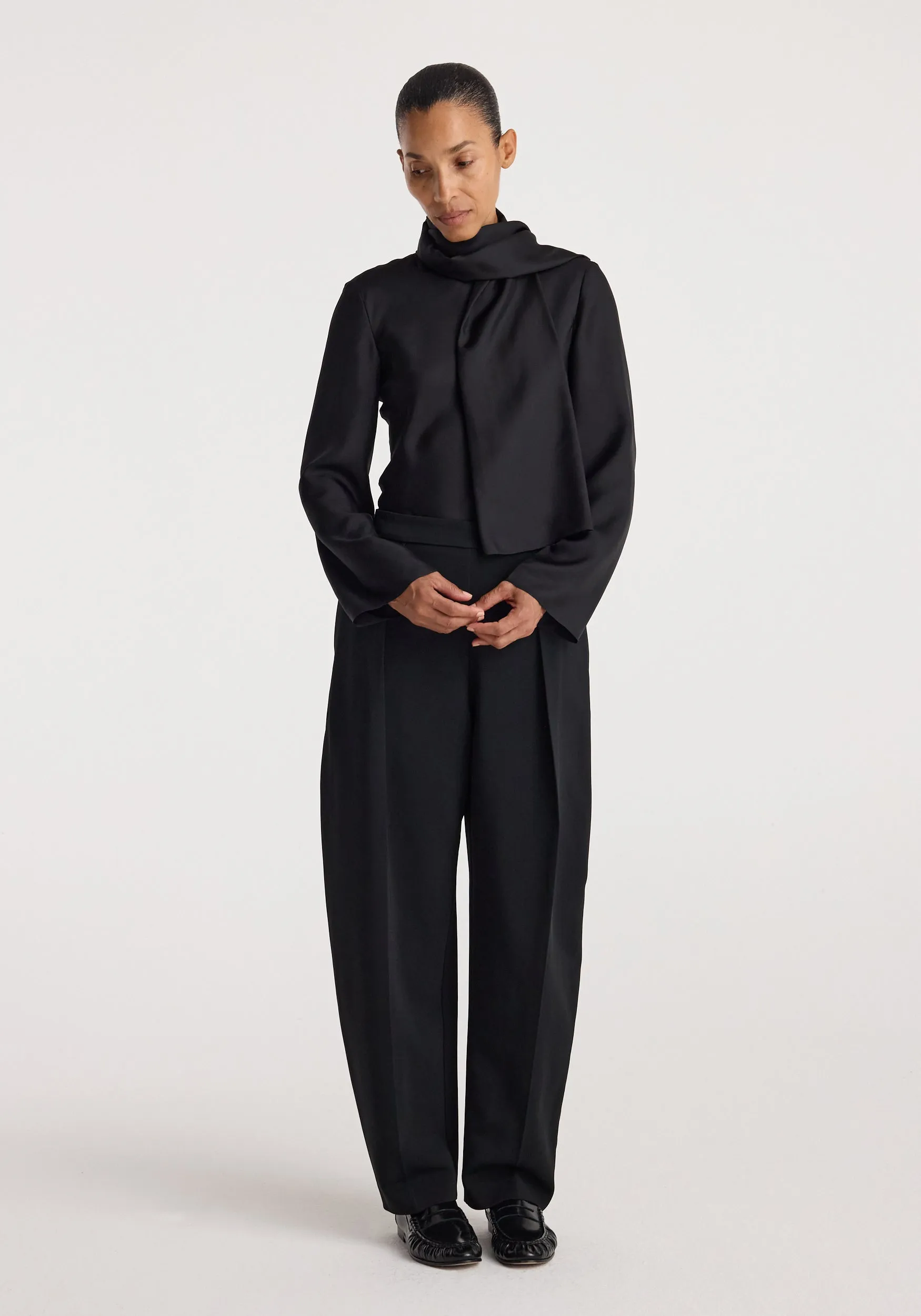 Puck - Sculptural tailored trousers | black sold by Rohe