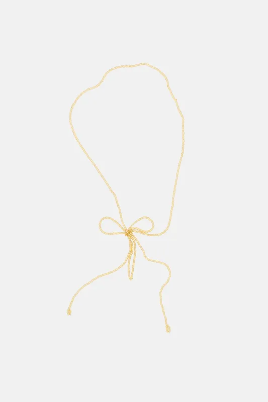 BOW NECKLACE - GOLD sold by Labro