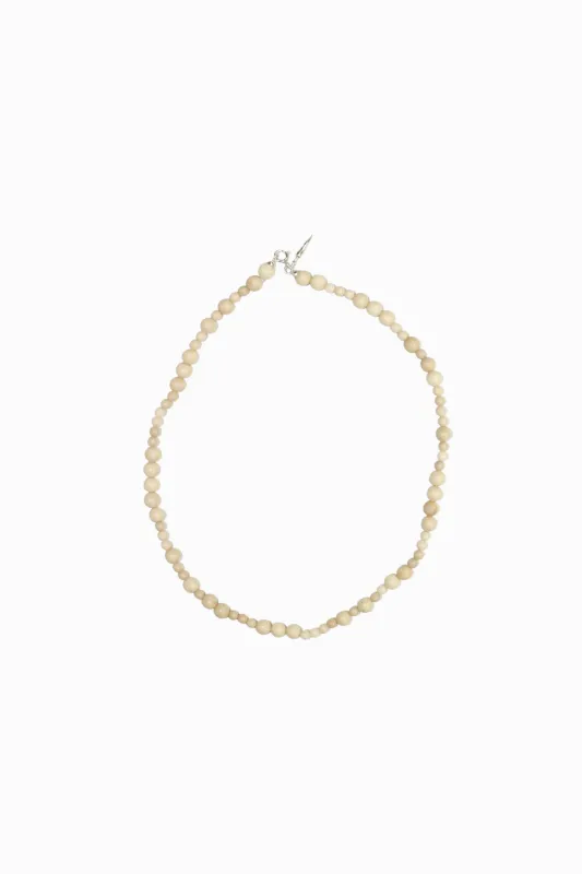 PICCOLO NECKLACE - WHITE FOSSIL made by Studio