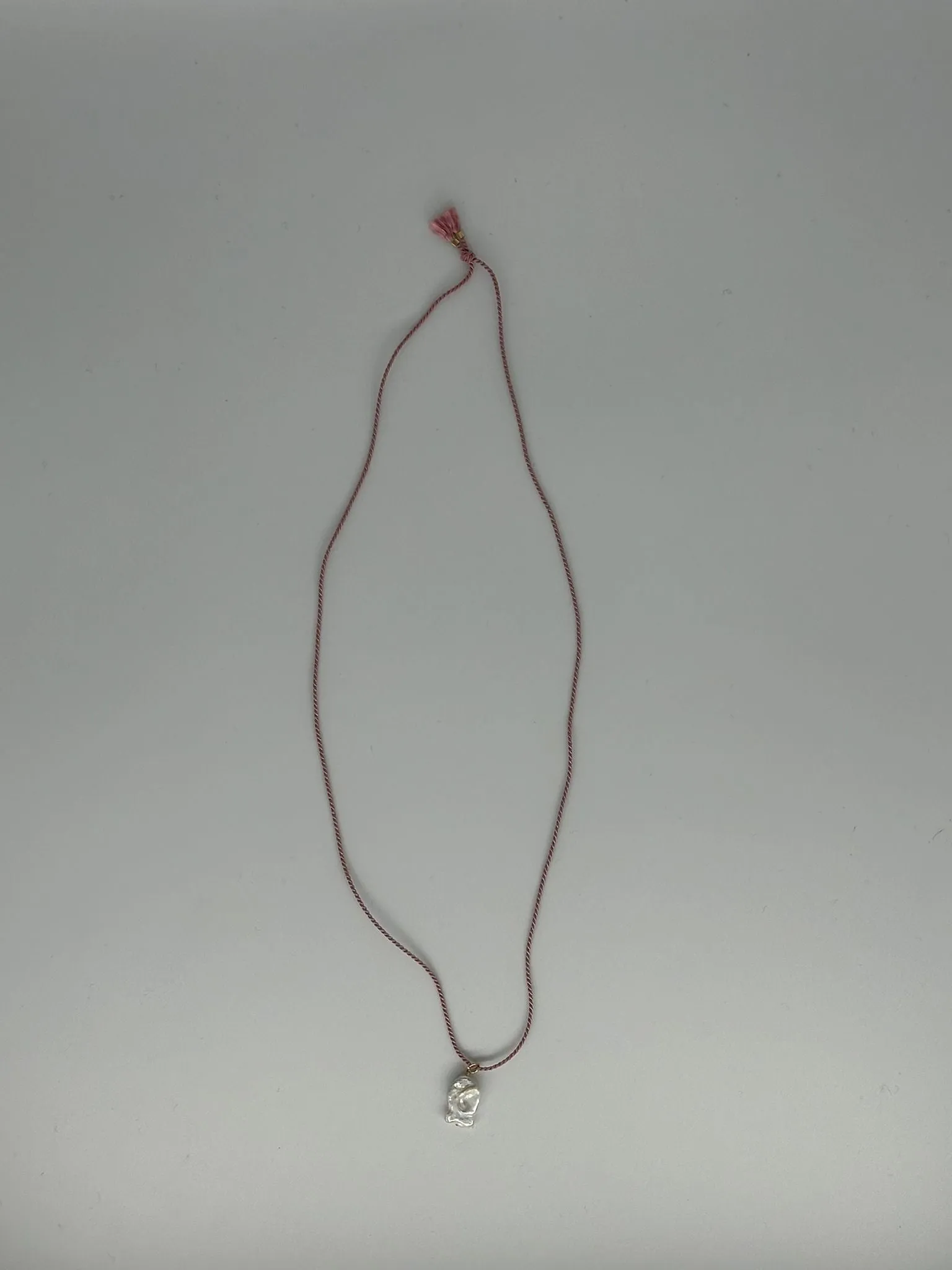 SAMPLE SALE SATIN CORD WITH PEARL FISH sold by Labro