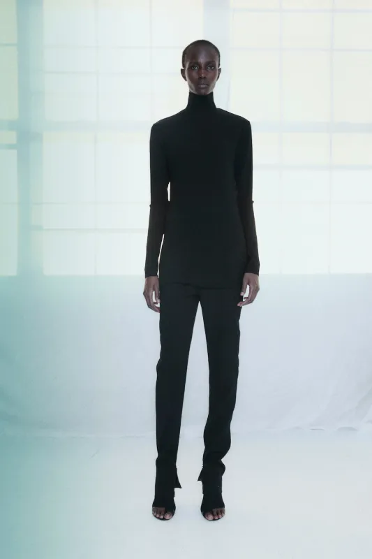 Long Sleeve Mockneck Tunic in Black sold by NOMIA