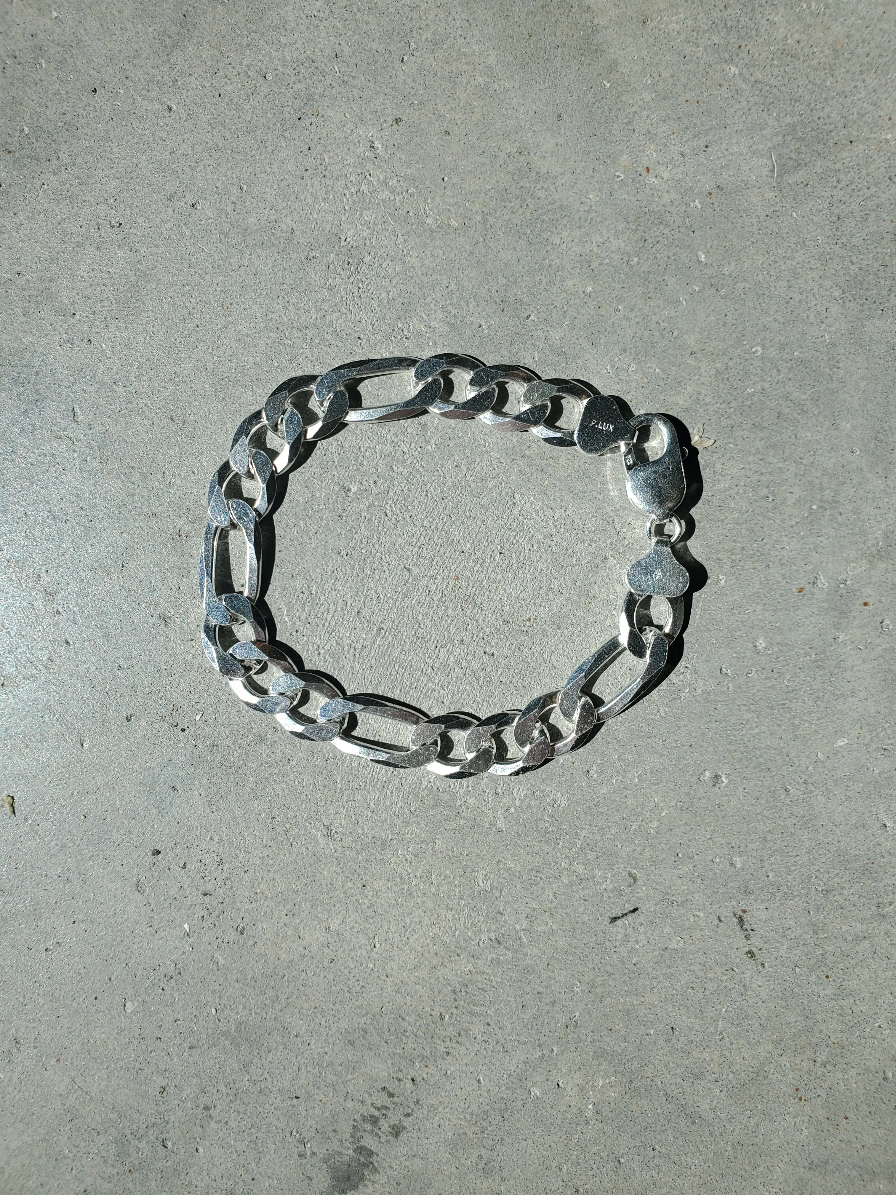 Large Figaro Sterling Silver Bracelet sold by NOMIA
