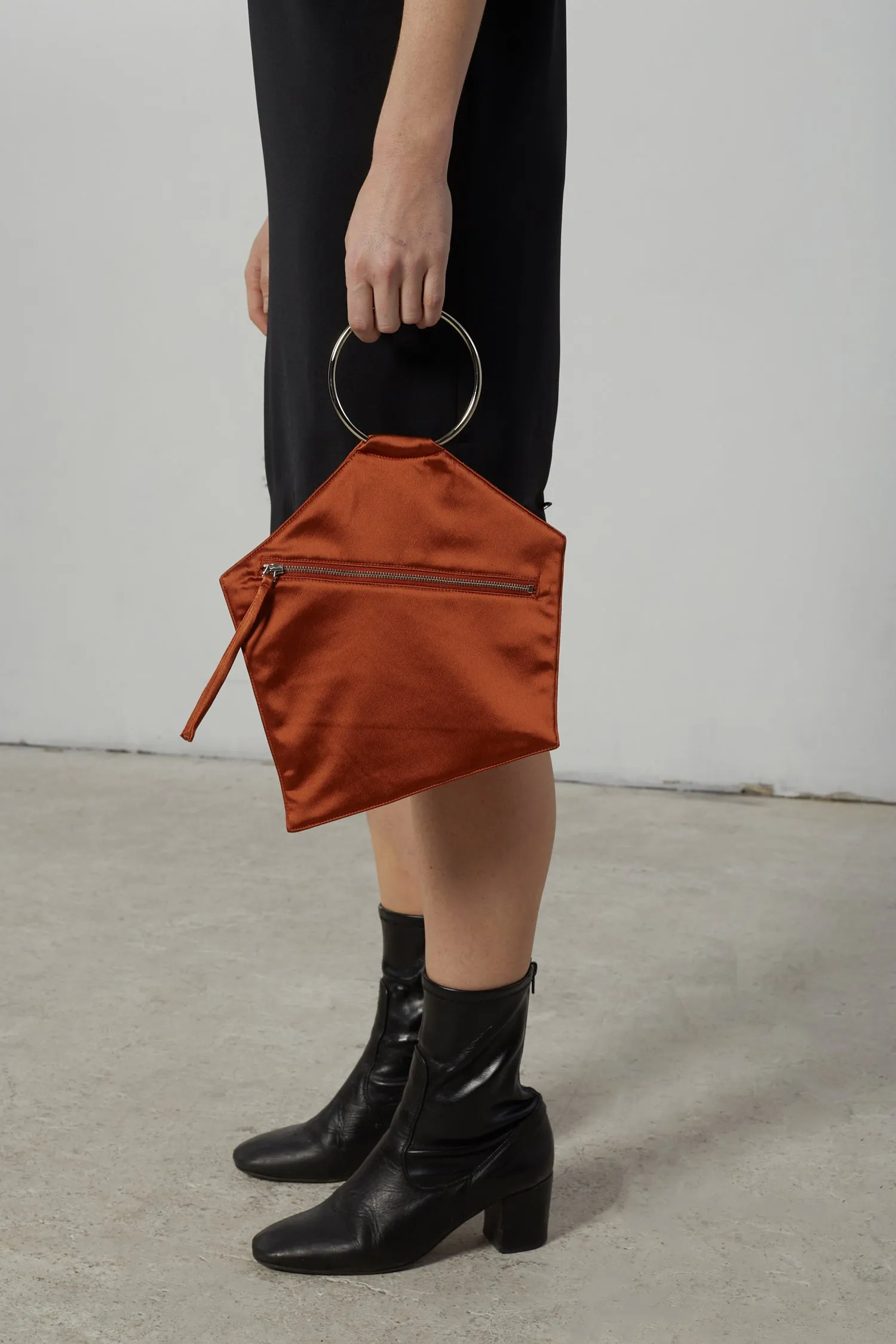 Polygon Clutch in Rust sold by NOMIA