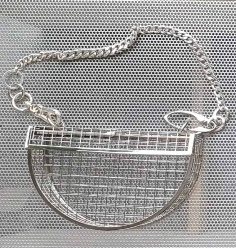 Martine Ali - Silver cage bag made by NOMIA