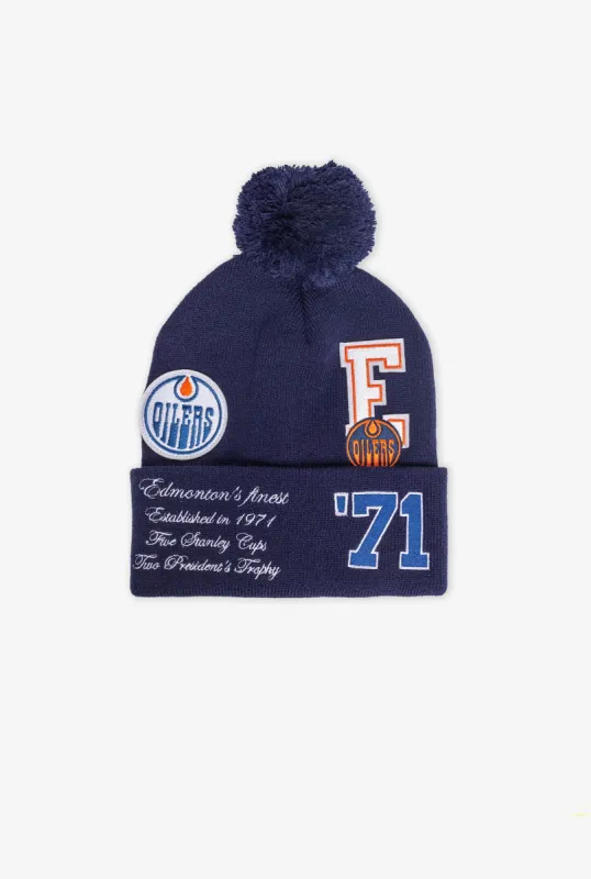 Edmonton Oilers Graduation Knit Beanie sold by Peace-Collective