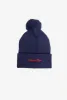 Edmonton Oilers Graduation Knit Beanie sold by Peace-Collective