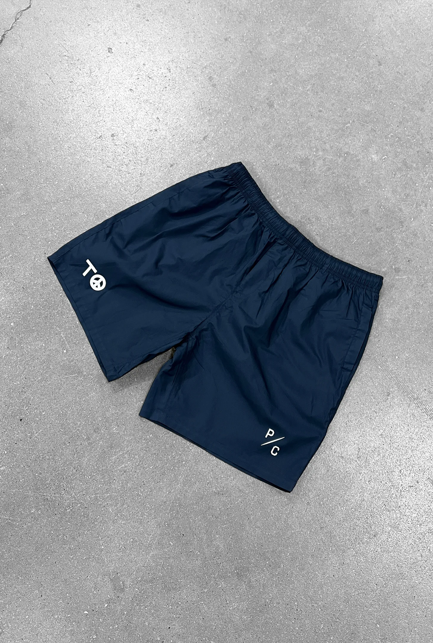 "TO" Peace Sign Board Shorts - Petrol Blue sold by Peace-Collective product image thumbnail 2