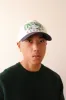 Ontario Loon Vintage Golfer - White/Navy sold by Peace-Collective
