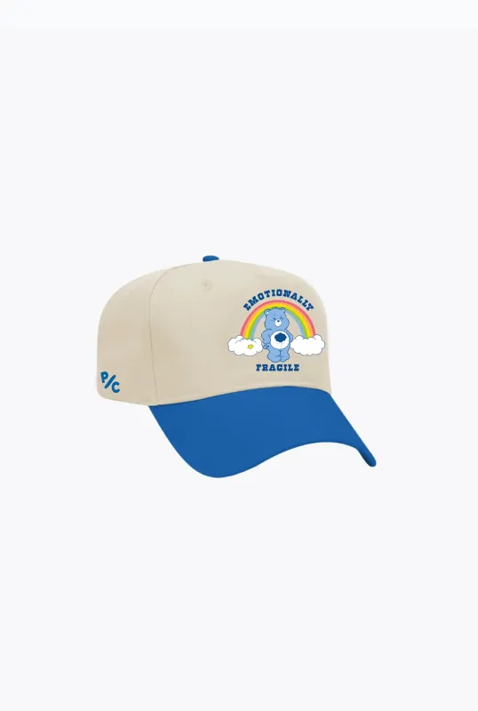 Care Bears Emotionally Fragile A-Frame Cap - Ivory / Blue sold by Peace-Collective