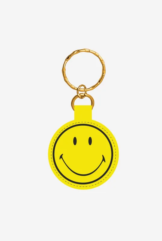 SMILEY: Being Human is Hard Keychain - Yellow sold by Peace-Collective