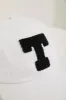 Soft baseball cap with T sold by Tristan Style