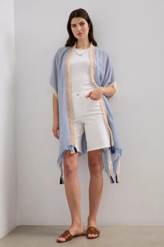 Cape with stripes and fringes sold by Tristan Style