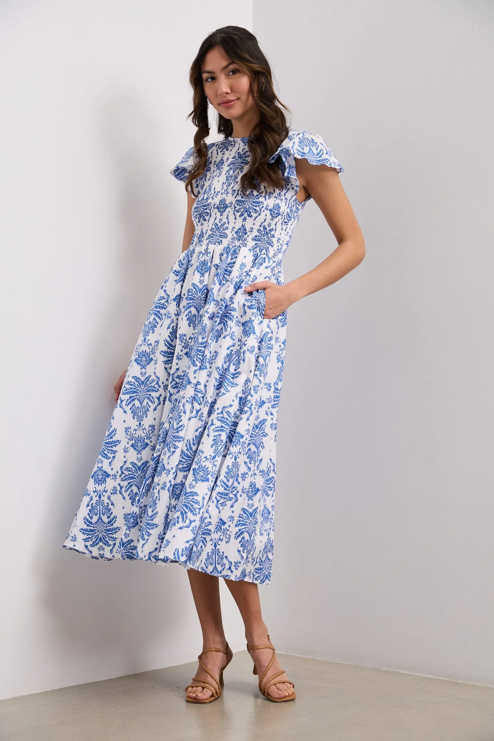 Midi printed dress with ruching sold by Tristan Style
