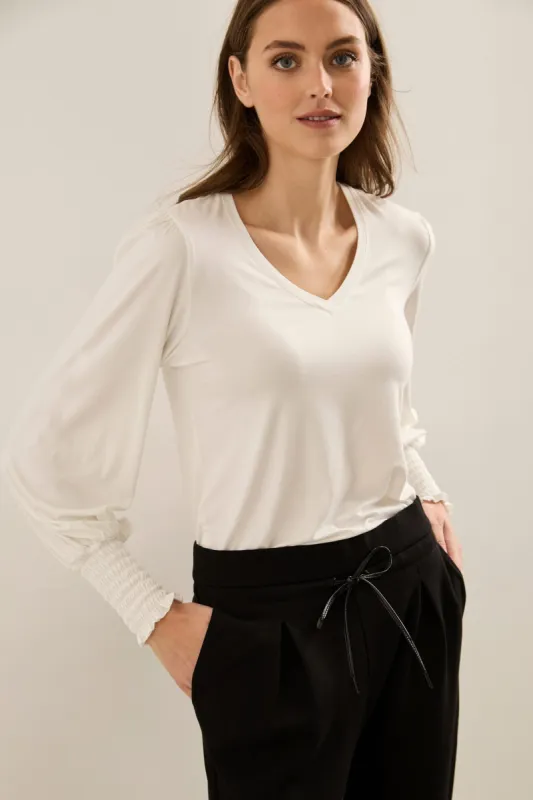 Jersey top with puffy sleeves sold by Tristan Style